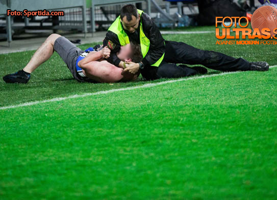 Fan of Gorica beaten by security guard when he wanted to sep into the court to celebrate victory after the football match between NK Maribor and ND Gorica in Final of Slovenian Cup 2014 on May 21, 2014 in Stadium Bonifika, Koper, Slovenia. Photo by Vid Ponikvar / Sportida
